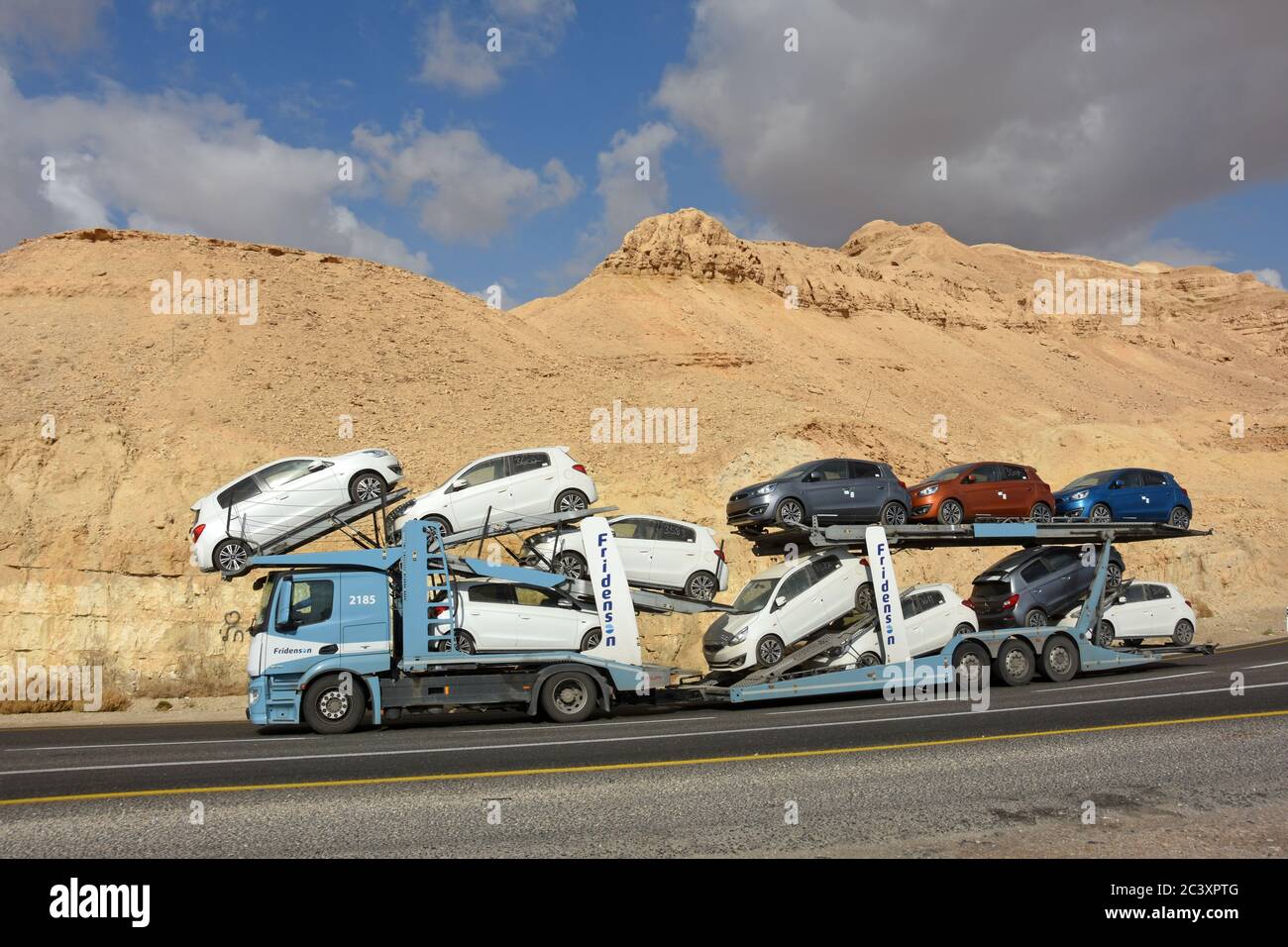 Transportation of new cars on a truck Stock Photo
