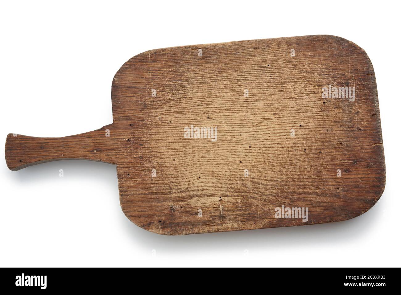 very old brown rectangular wooden kitchen cutting board with handle ...