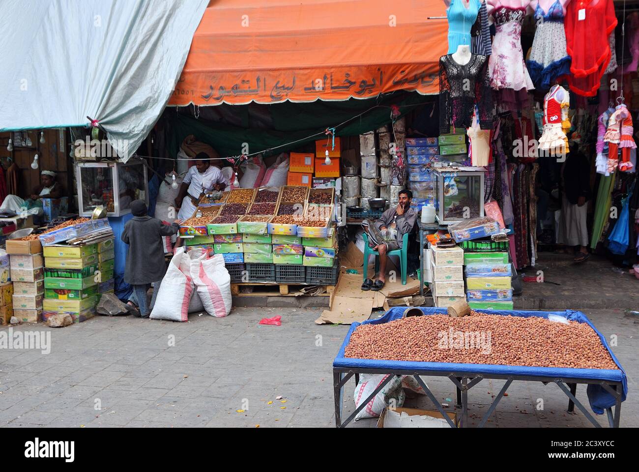 Sanaa, Yemen - March 6, 2010: Unidentified men sell goods on the street