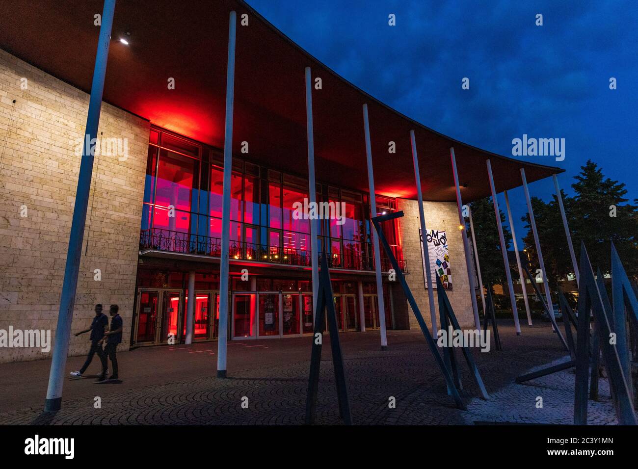 Mülheim an der Ruhr, Germany. 22 June 2020. Pictured: Stadthalle events venue. 'Night of Light' is not only an appeal to politics but also a cry for help to save the entertainment industry, as all large-scale events are prohibited because of the  Coronavirus / COVID-19 crisis. During the night of 22 June to 23 June 2020, many German buildings are illuminated in red light to raise awareness of the dramatic situation this industry is facing. Photo: 51North/Alamy Live News Stock Photo