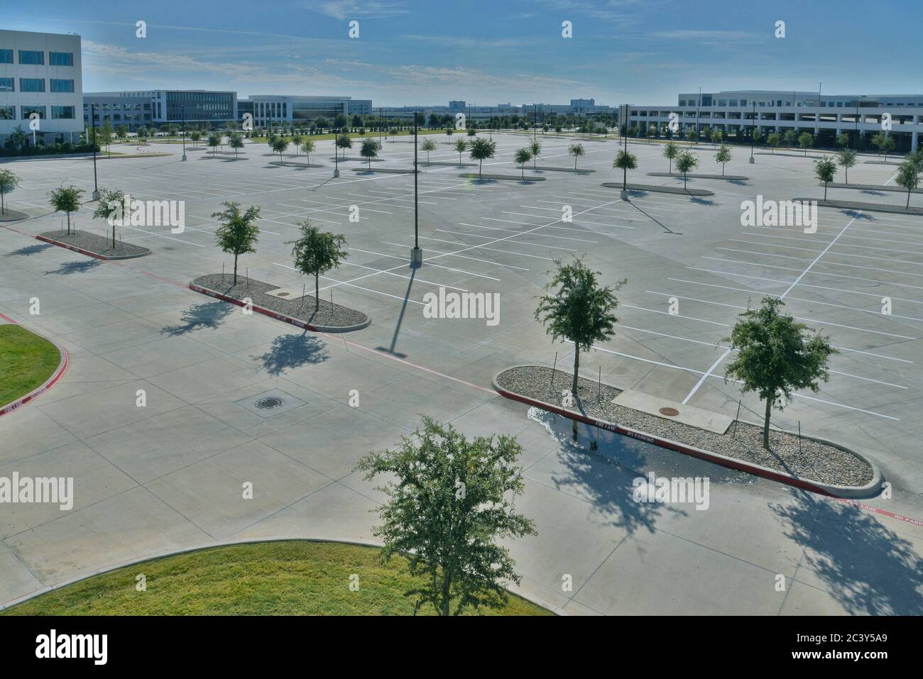 Empty parking lots at corporate office park due to Corona Virus Stock Photo
