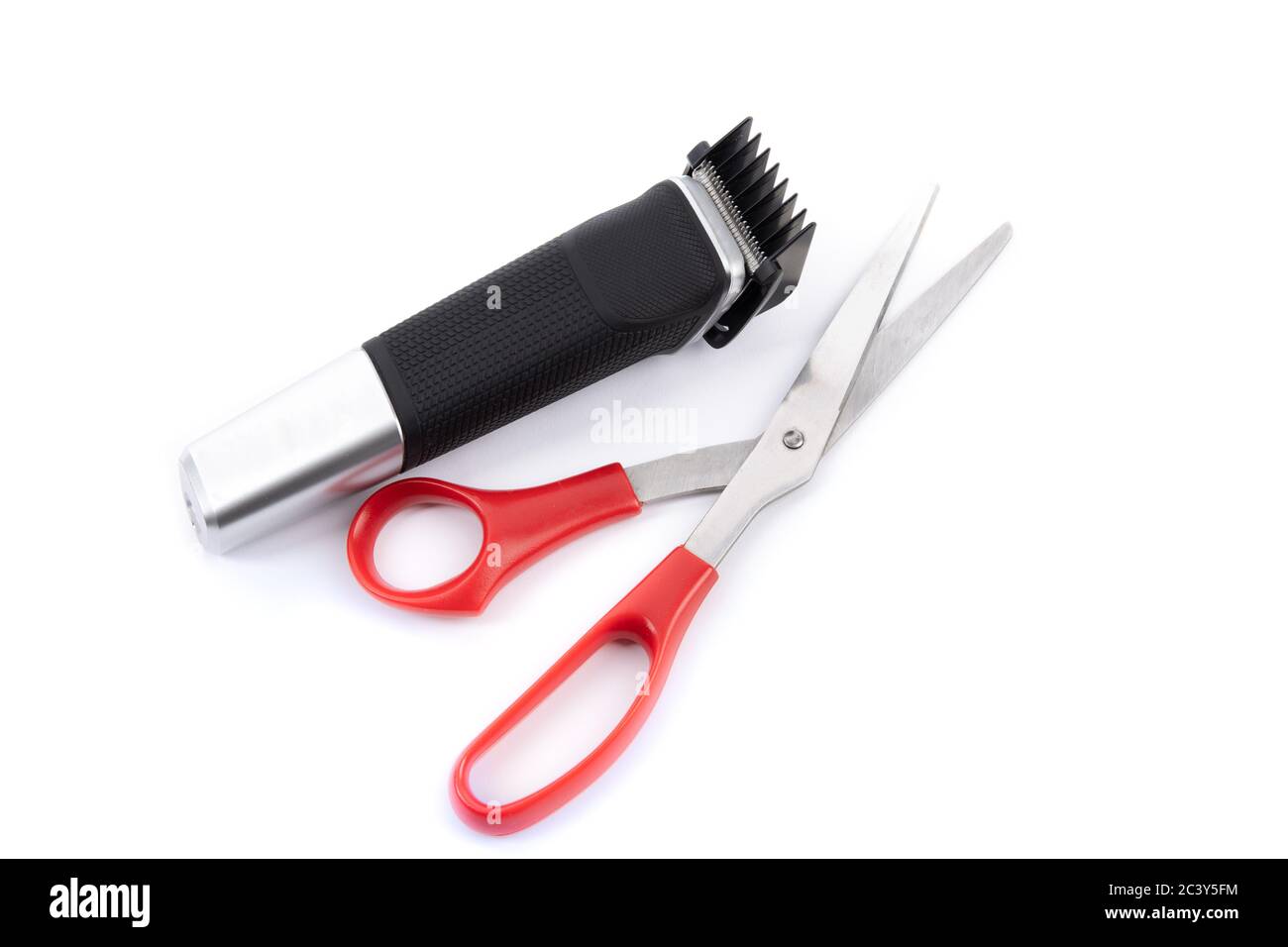 hair cutting tools for a home haircut, electric clipper and scissors Stock  Photo - Alamy