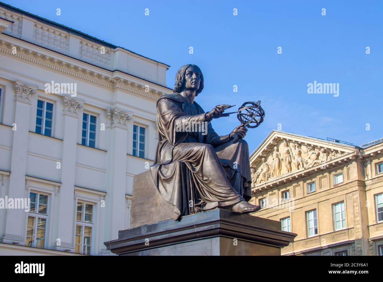 The Statue of astronomer Nicolaus Copernicus in Warsaw Poland, who who formulated a model of the universe that placed the Sun rather than the Earth Stock Photo