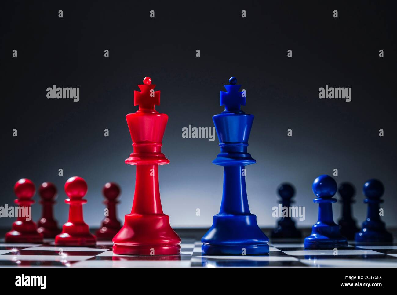 Studio shot of red and blue chess pawns symbolizing US Democratic and Republican parties Stock Photo