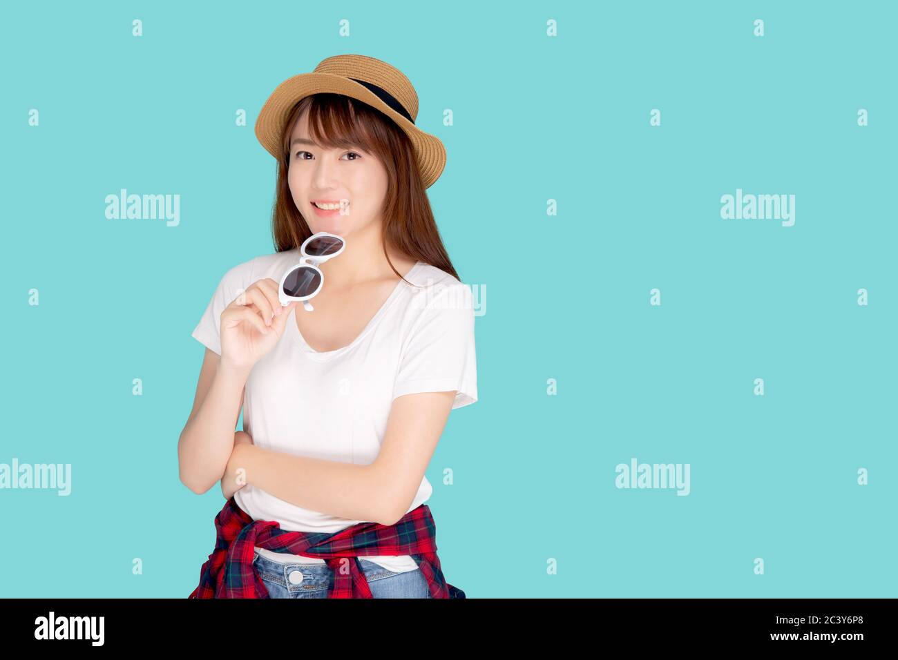 Beautiful portrait young asian woman wear hat and holding sunglasses ...