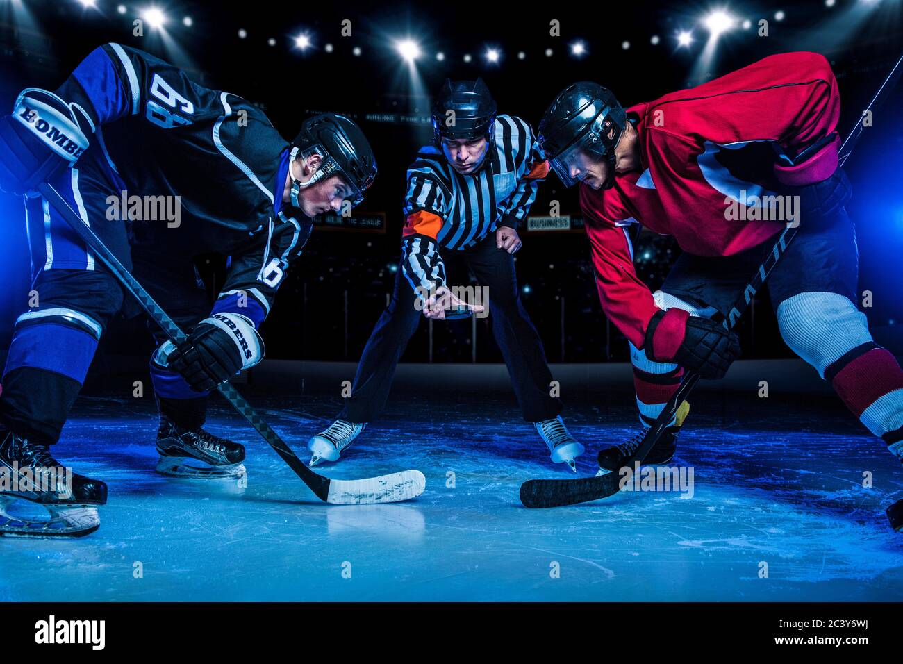 Hockey players and referee starting match Stock Photo Alamy