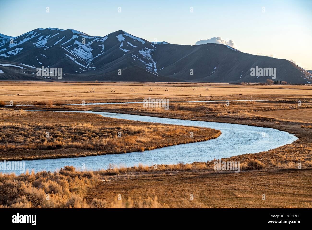 USA, Idaho, Picabo, Landscape with Silver Creek fields and mountain