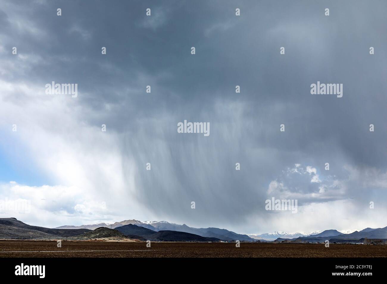 USA, Idaho, Picabo, Storm clouds over fields Stock Photo