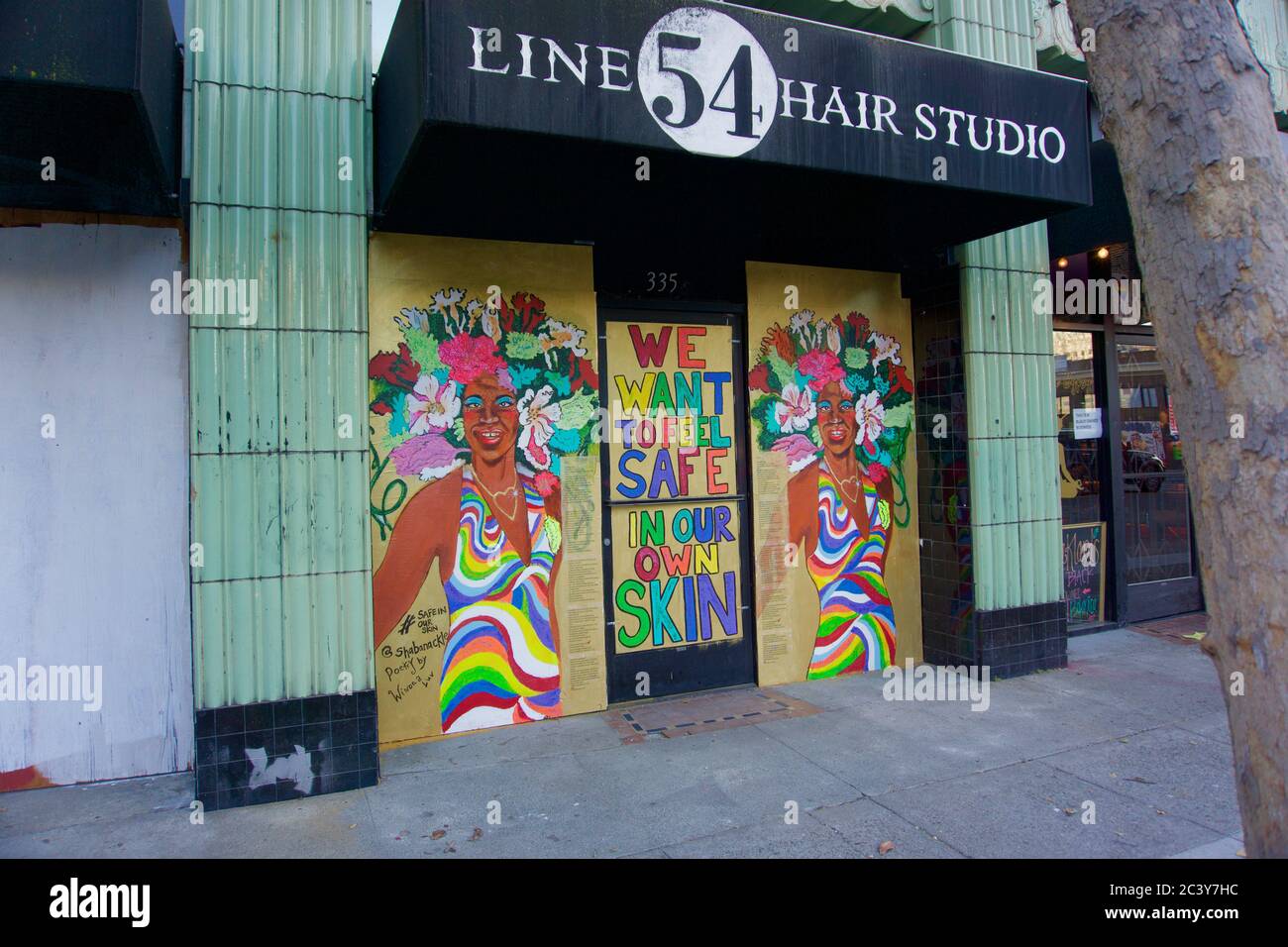 Black Lives Matter and transgender street art on boarded up buildings ...
