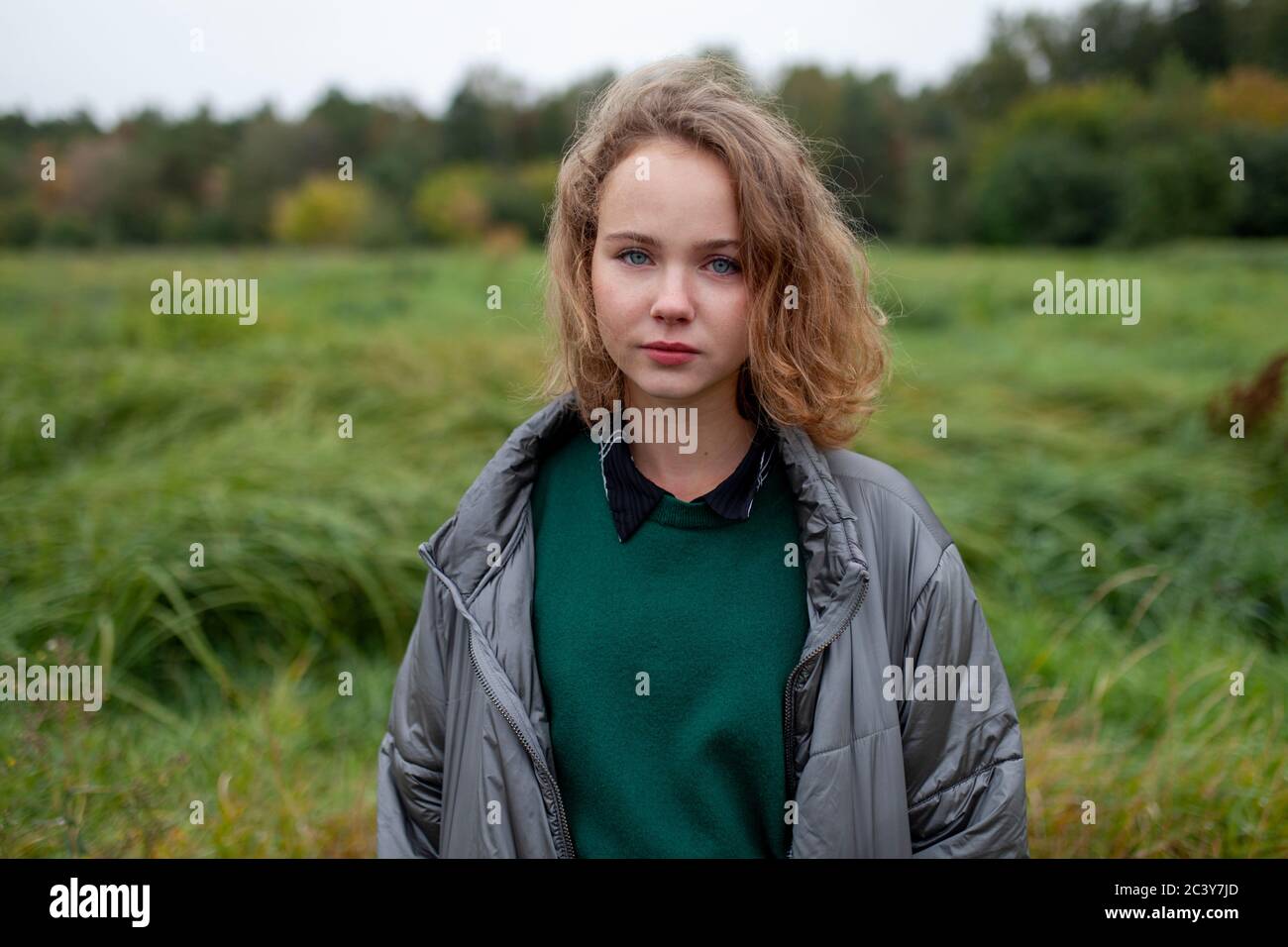 Russia, Omsk, Portrait of teenage girl in meadow Stock Photo