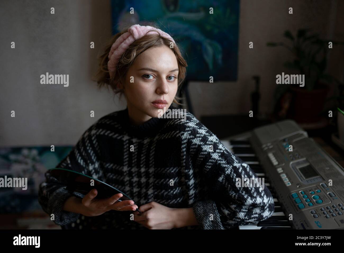 Portrait of mid adult woman at home Stock Photo