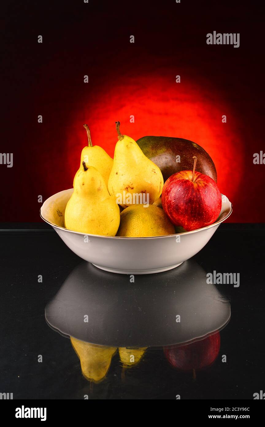 Mixed fruit on a basket Stock Photo