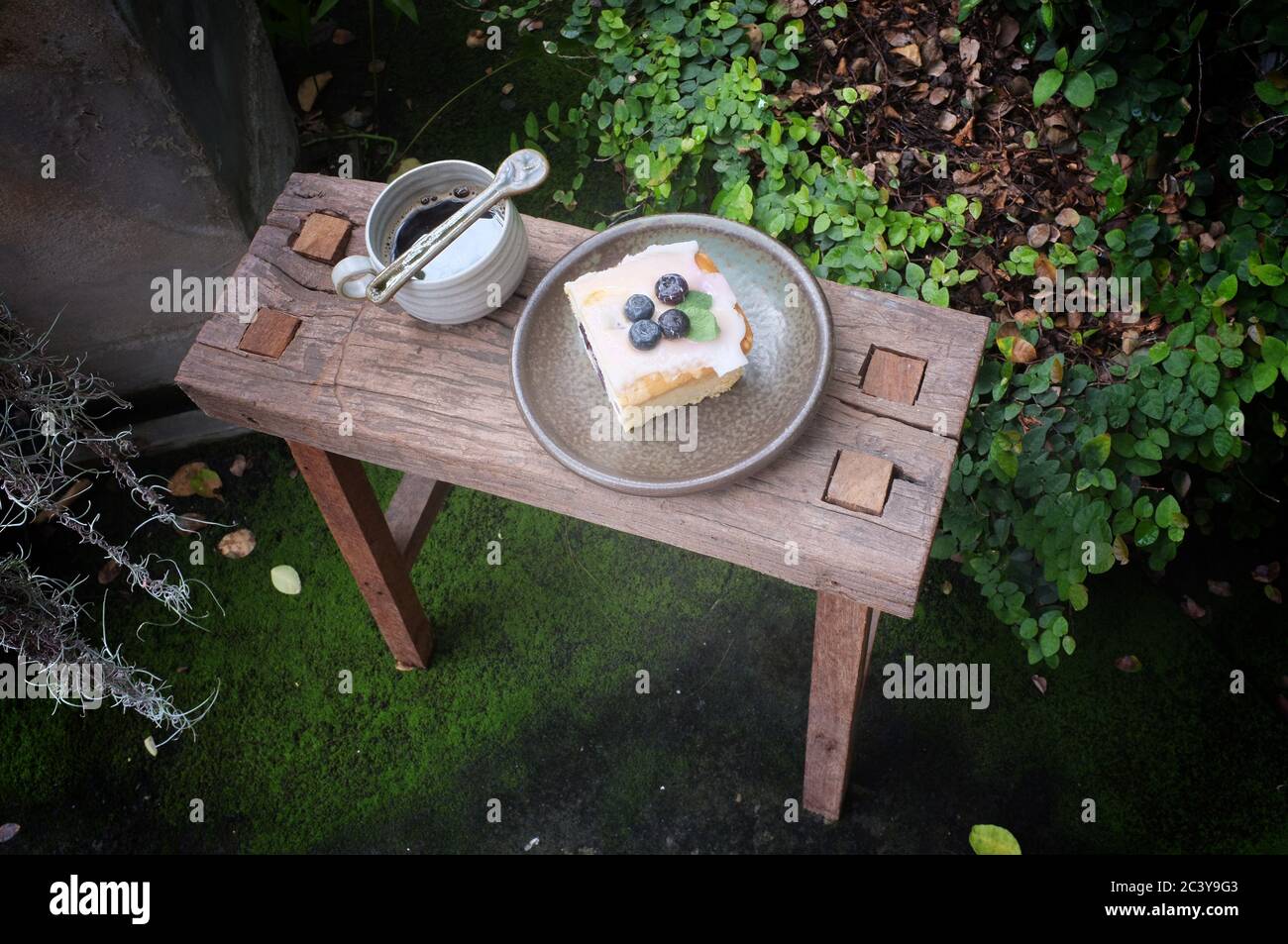 Coffee with piece of cake on wooden table , Concept Relax time, Copy space. Place for text. Stock Photo