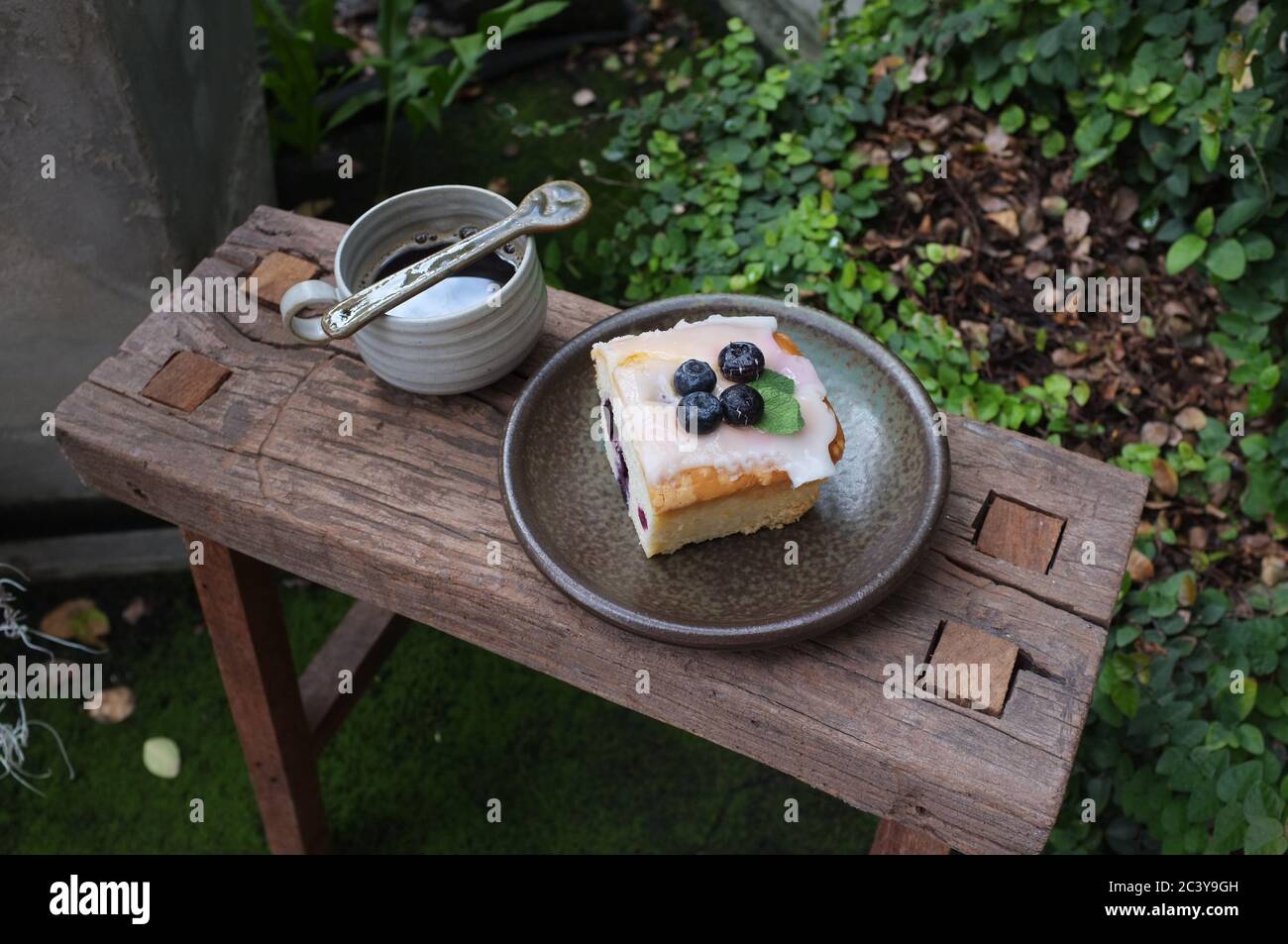 Coffee with piece of cake on wooden table , Concept Relax time, Copy space. Place for text. Stock Photo