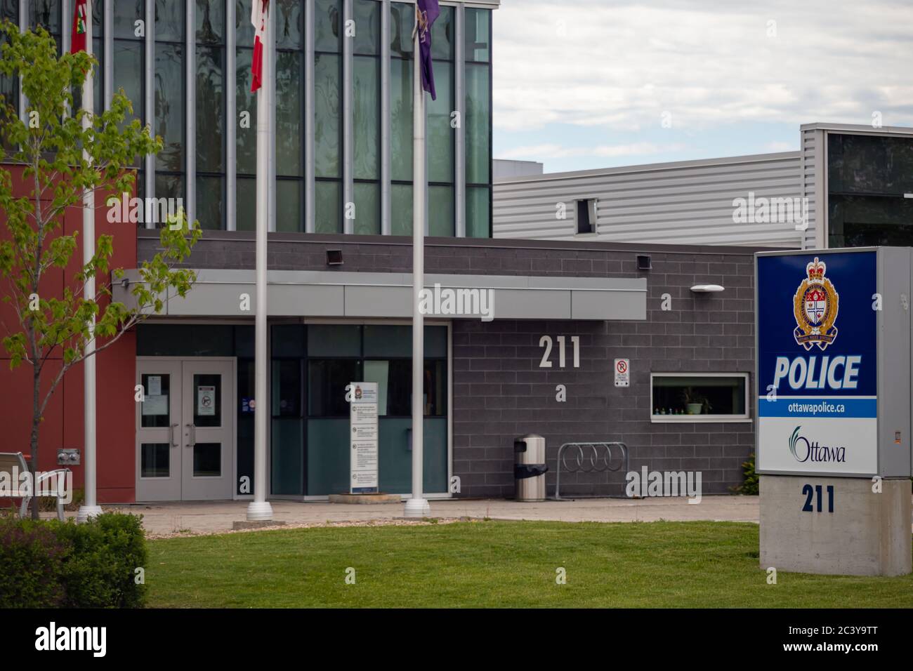 The Ottawa Police station in at 211 Huntmar Drive in Ottawa, Ontario, Canada offers collision and crime reporting services through its service desk. Stock Photo