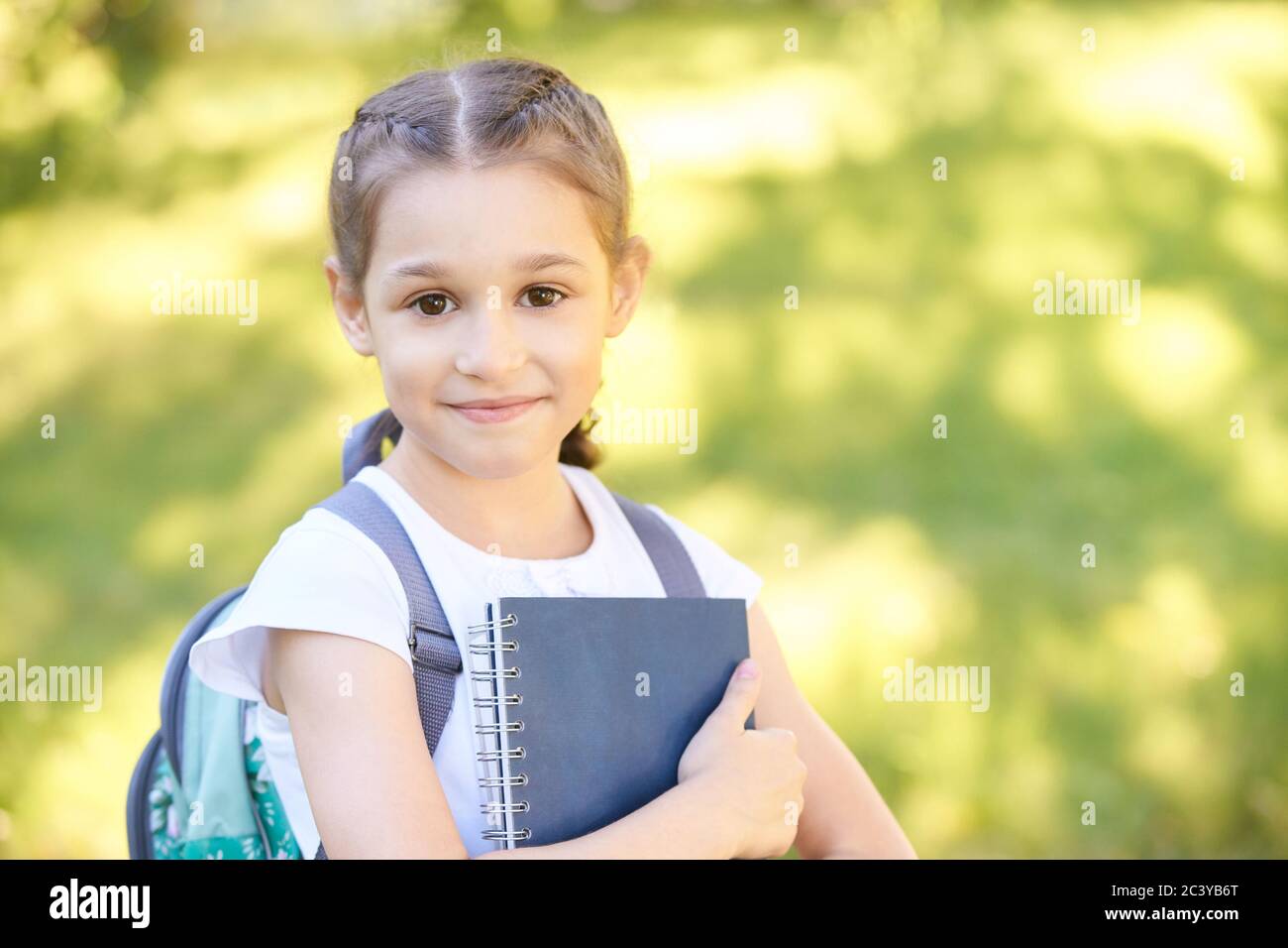 smart kindergarten. blue reading. back to school together with handsome friends. First grade question Stock Photo