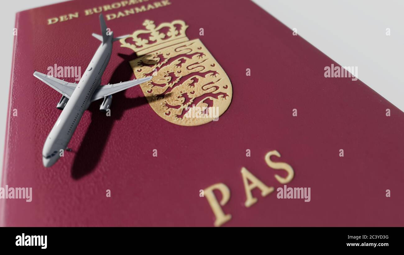 Danish passport an airplane Stock Photo