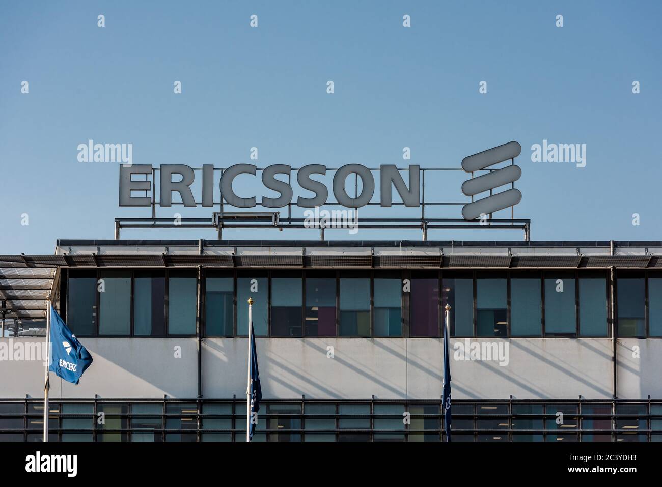 Gothenburg, Sweden - April 29 2019: Sign of telecom company Ericsson on top of a building at Lindholmen. Stock Photo