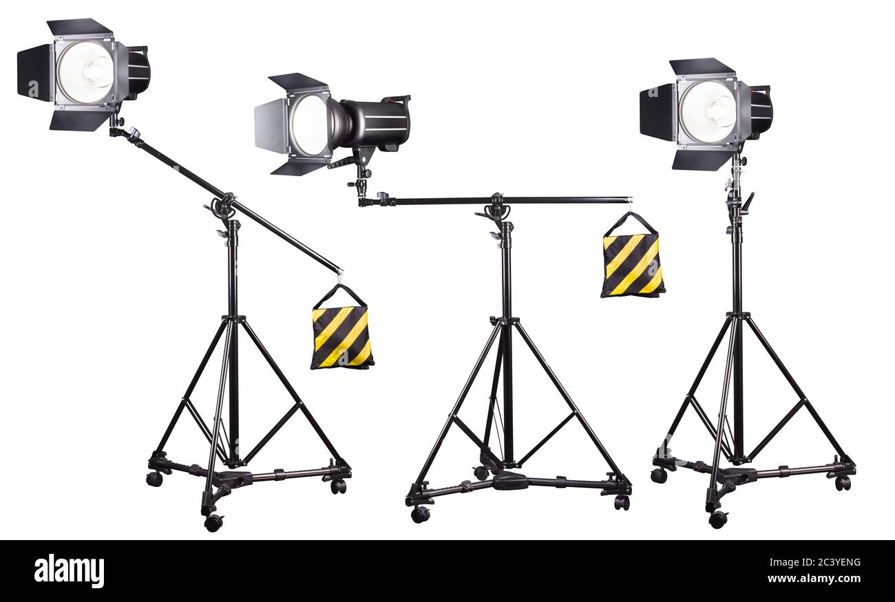 Photo studio lighting stands with flash and softbox isolated on the