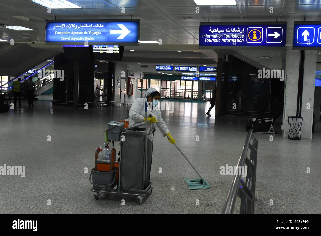 Tunis, Tunisia. 22nd June, 2020. A staff member cleans floor at the Tunis  Carthage International Airport in Tunis, Tunisia, June 22, 2020. Tunisia is  preparing to open its air, land and sea