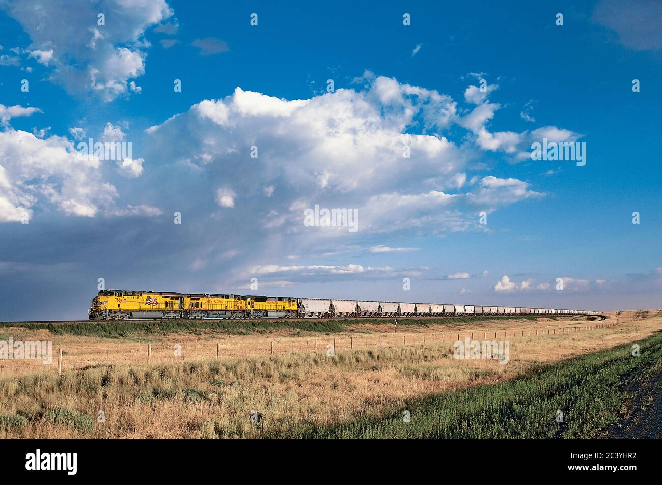 Union Pacific Freight Train with Thunderhead Stock Photo