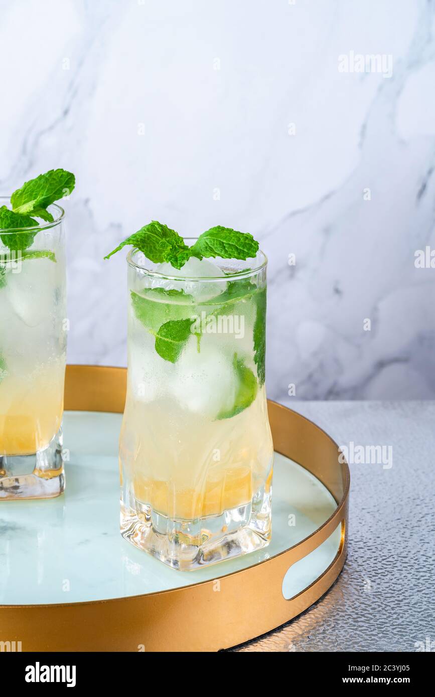 Mint infused Bramley Apple gin cocktail with elderflower cordial Stock