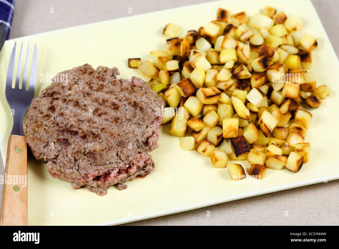 ground beef steak and hash browns Stock Photo Alamy