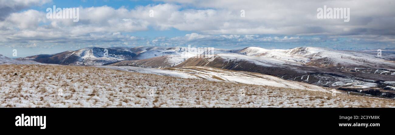 Snowy winter panoramic view of the Howgill Fells taken from Wild Boar Fell Stock Photo