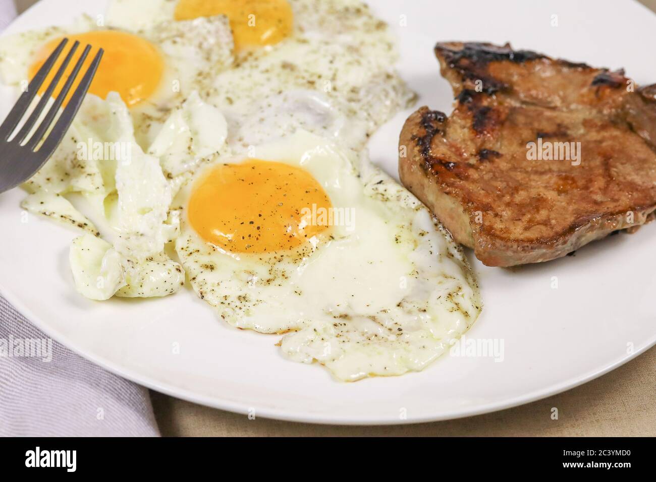 veal liver and fried eggs Stock Photo Alamy