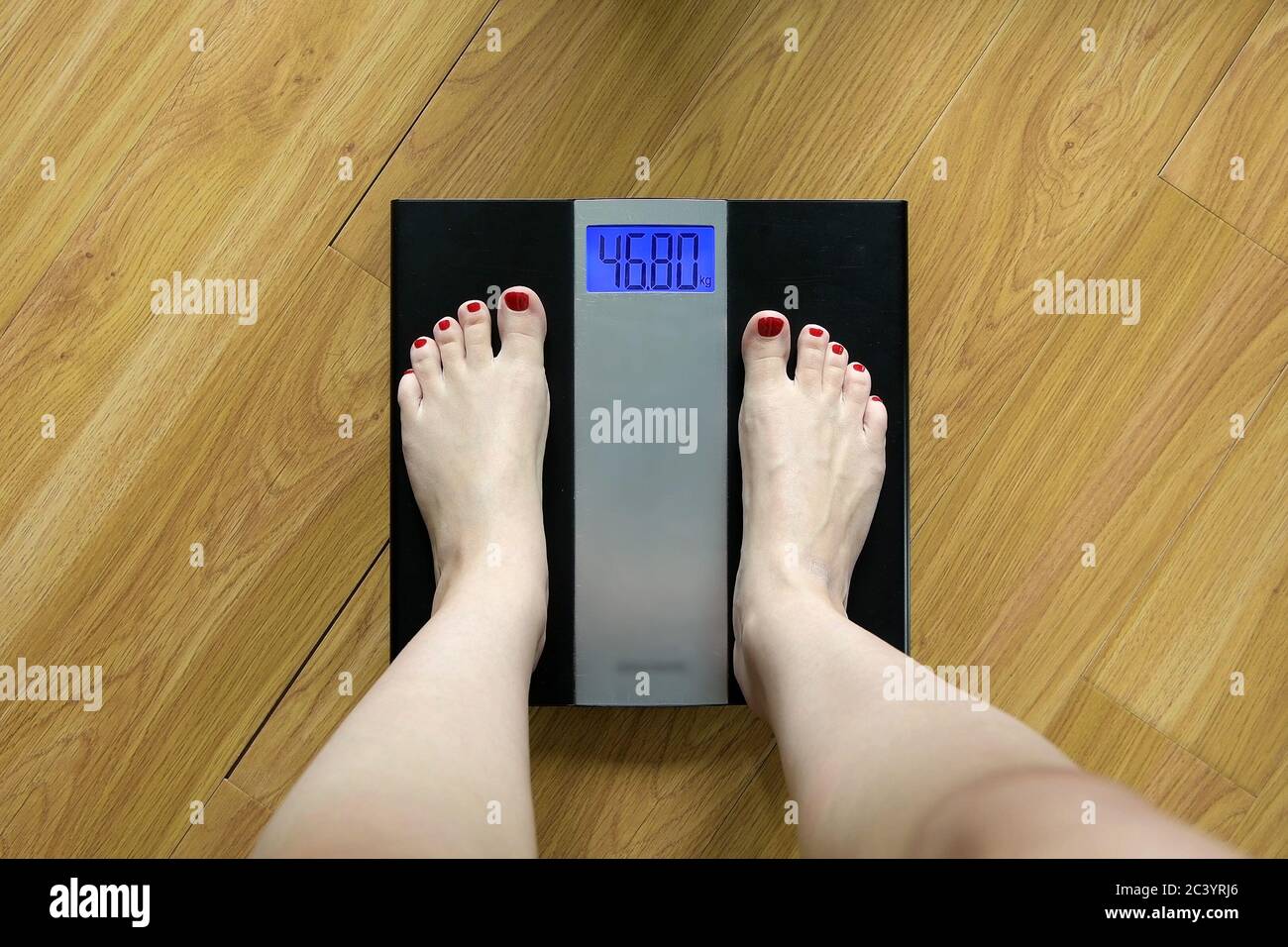 Overweight Fat Woman On The Weight Scale Stock Photo, Picture and Royalty  Free Image. Image 11259411.