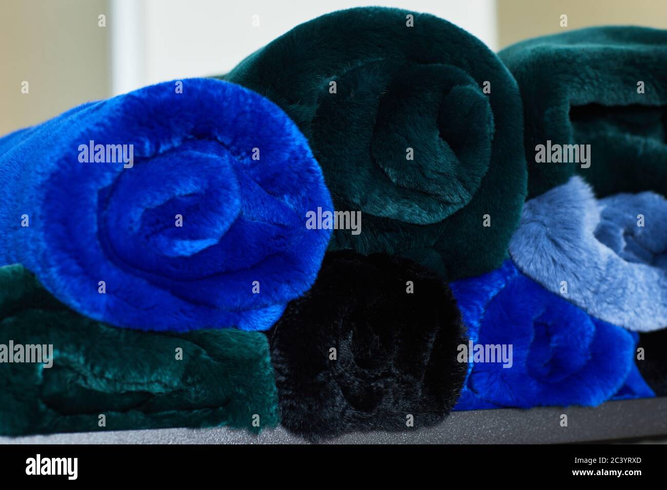 different types of Artificial fur in the store. fur fabric Stock Photo