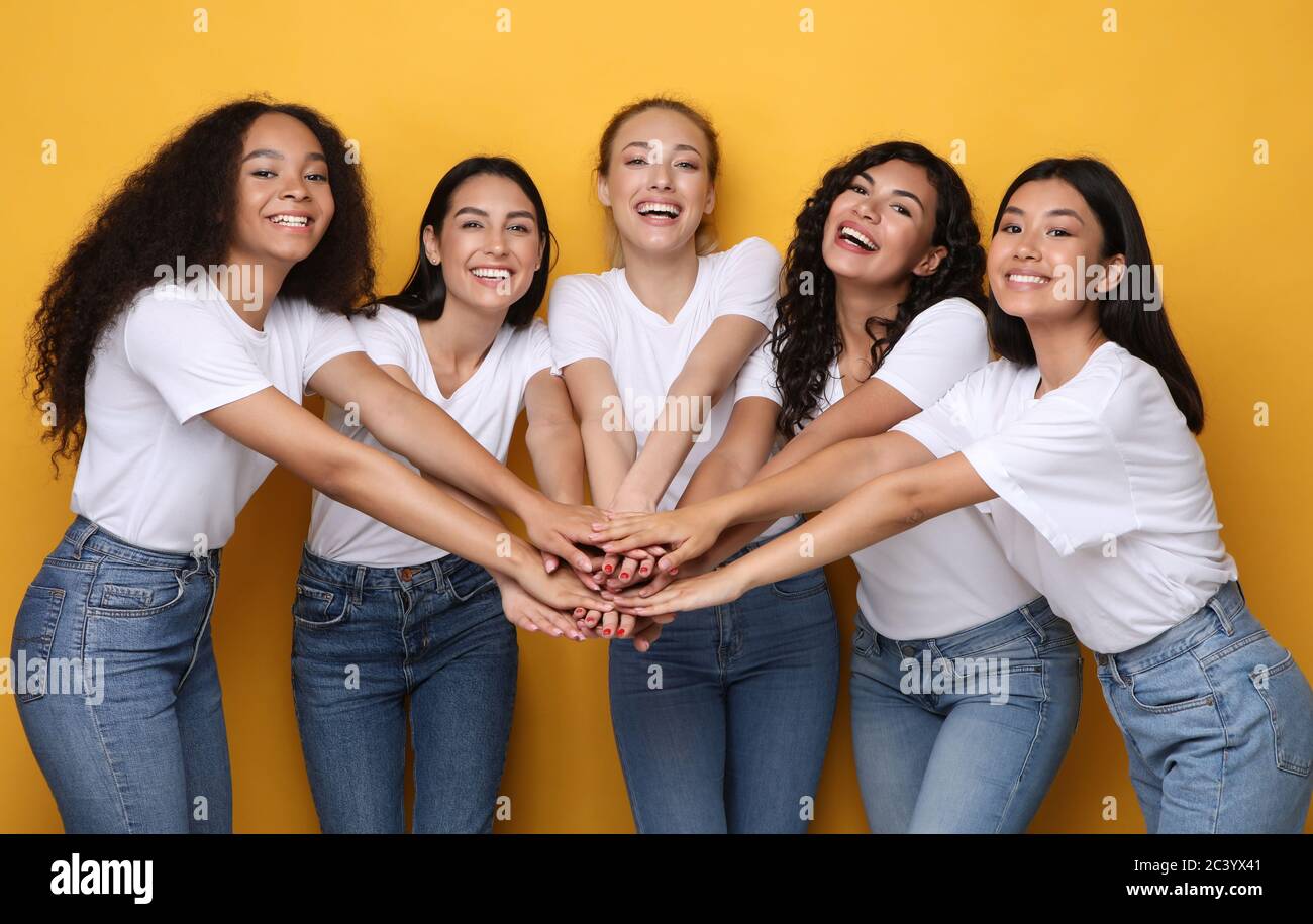 Asian girls holding hands hi-res stock photography and images - Alamy
