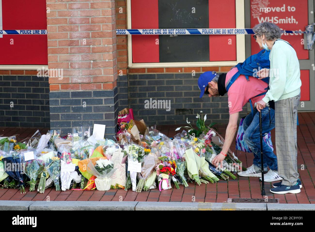 Floral tributes are left at Forbury Gardens, in Reading town centre, the scene of a multiple stabbing attack which took place at around 7pm on Saturday, leaving three people dead and another three seriously injured. Stock Photo
