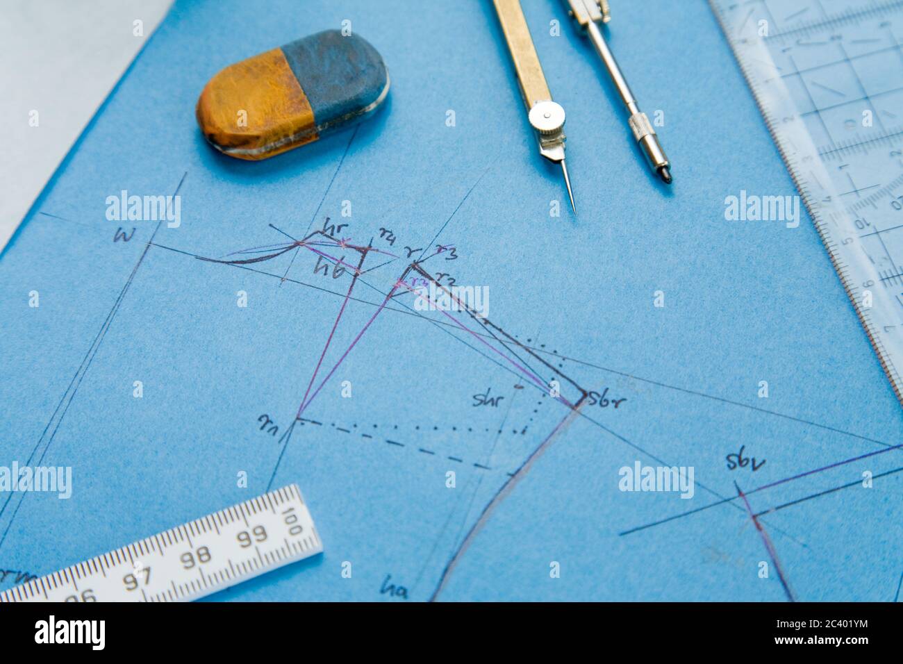 Details of a pattern with compass and eraser Stock Photo