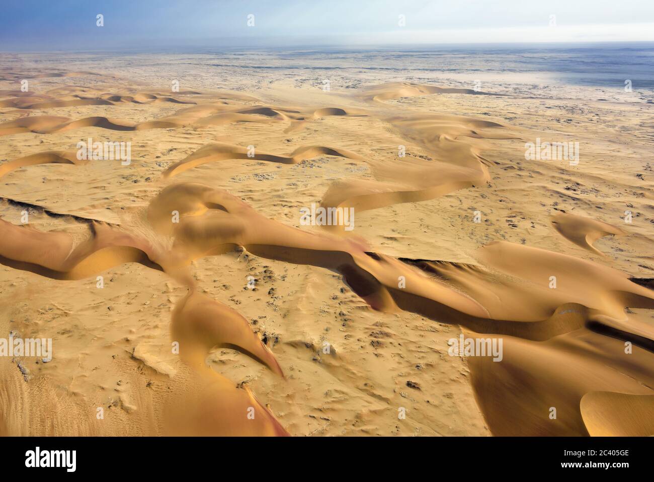 Aerial view on the beautiful landscape of the Namib Desert at sunset ...