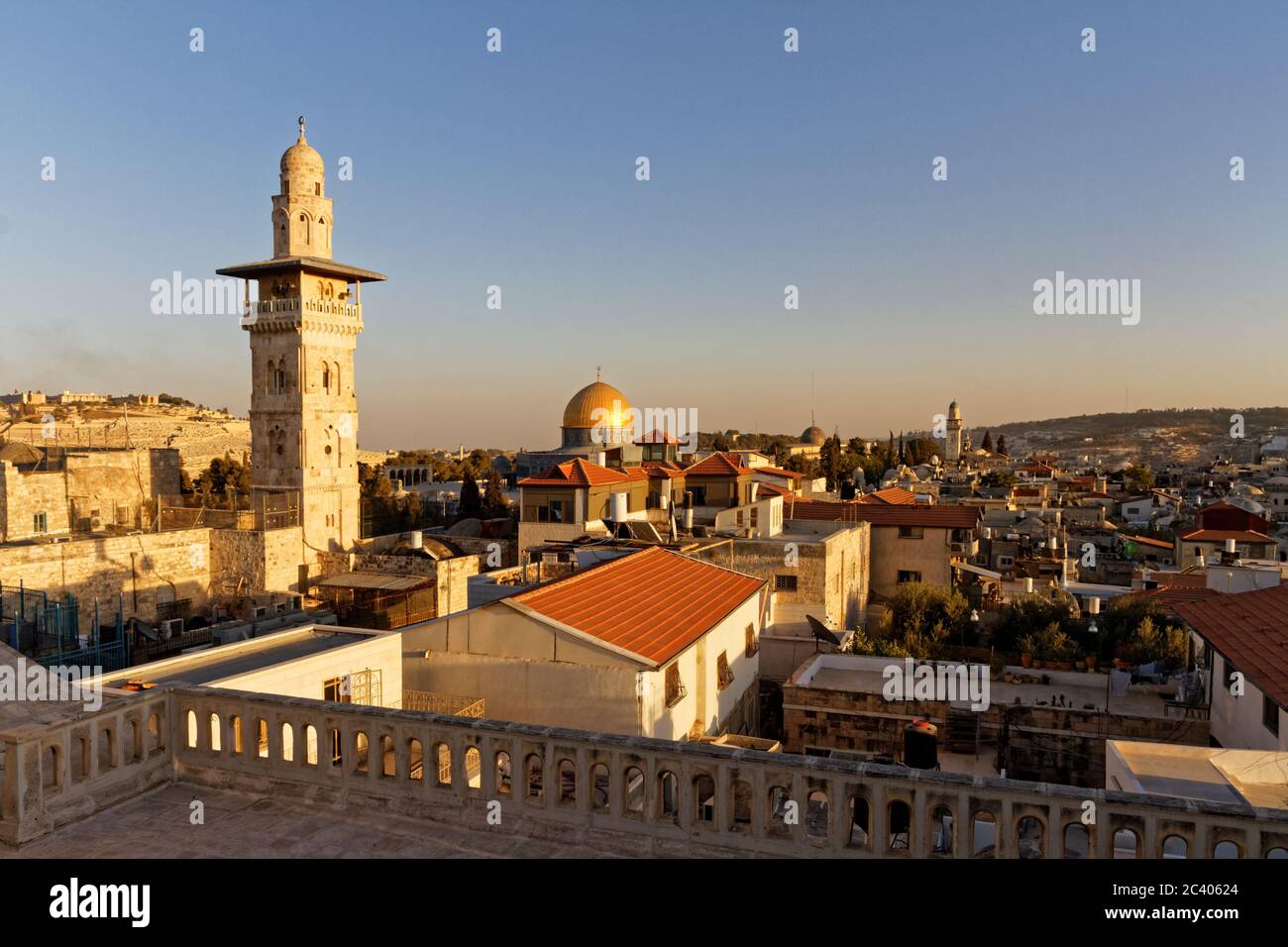 Sunset view old City of Jerusalem from Ecce homo pilgrim house Roof, via Dolorosa street. El-Ghawanima Tower and Al Aqsa Mosque, Dome of the Rock. Stock Photo