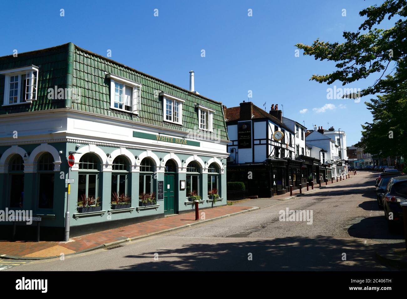 View looking up High Street with The White Bear public house on left, G