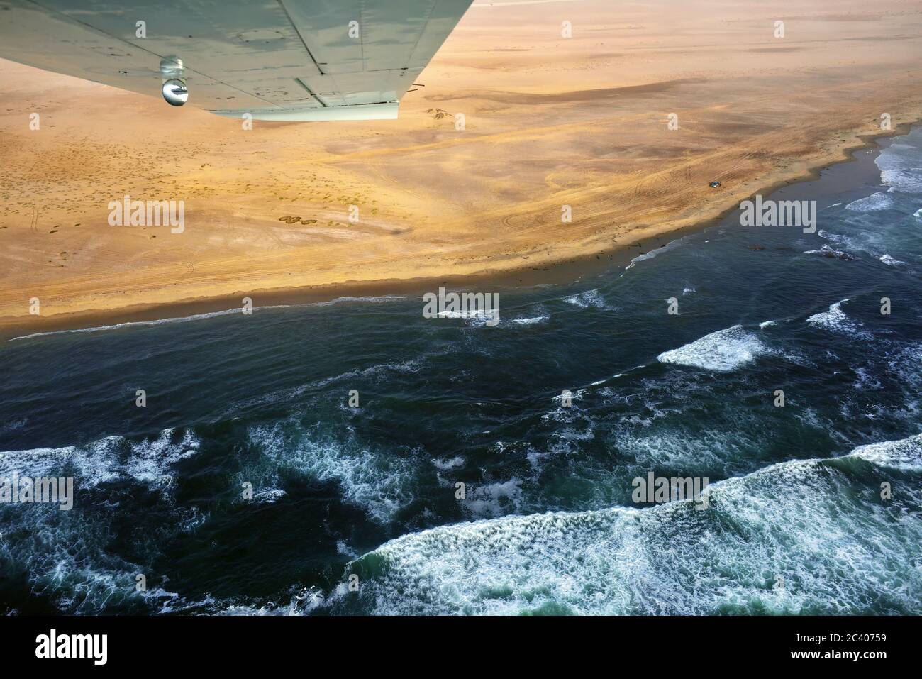 Ocean In Namibia Flight over the Sceleton coast in Namibia where dunes of the Namib ...
