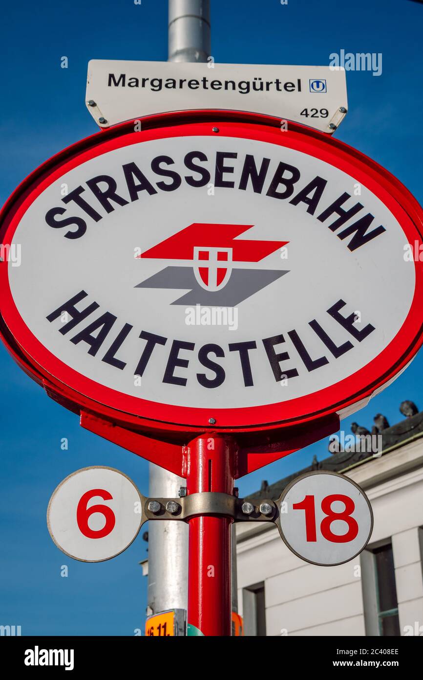 A tram stop sign in the Austrian capital, Vienna. Close up view red white tram stop sign at tram station. Stock Photo