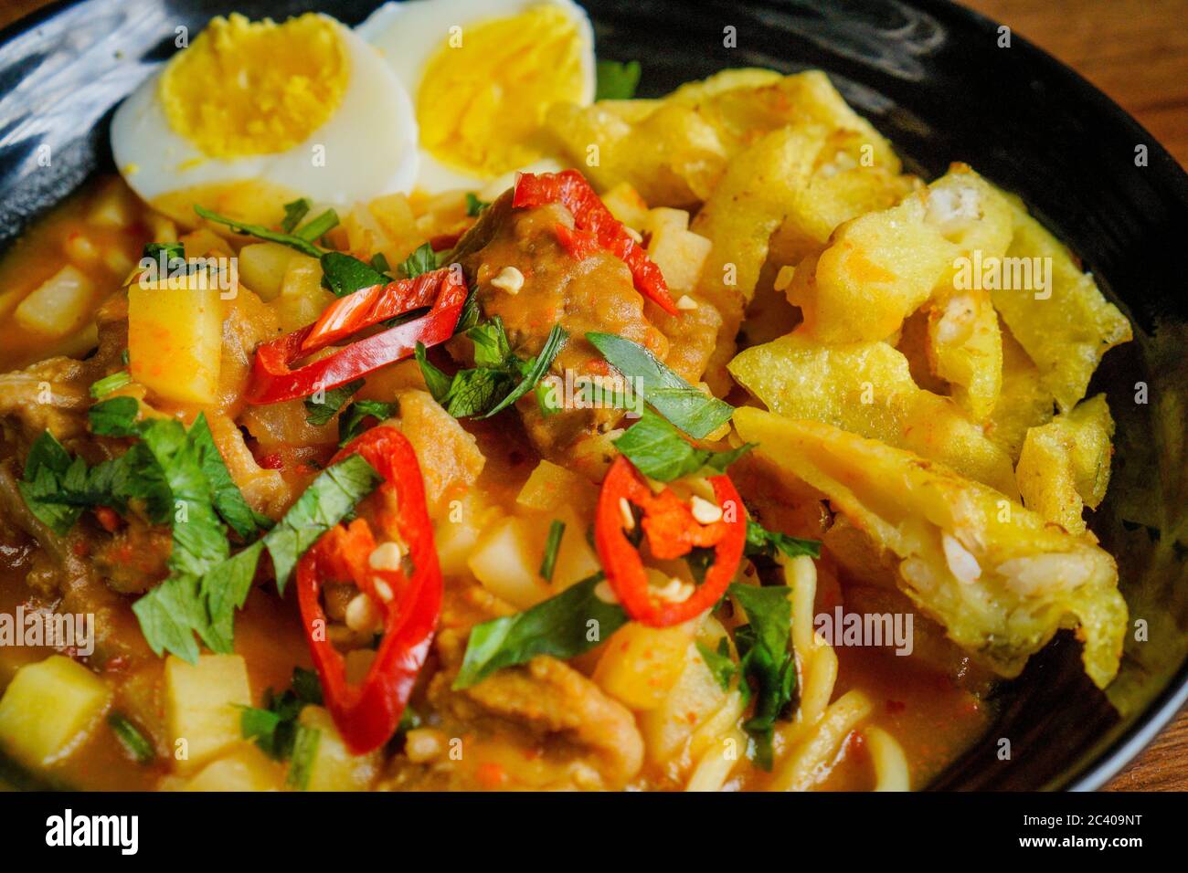 Mee Rebus Is A Malay Noodle Dish In A Sweet Potato Based Gravy The Combination Of Sweetness And Savoury Flavours Are Deliciously Enhanced With A Gene Stock Photo Alamy