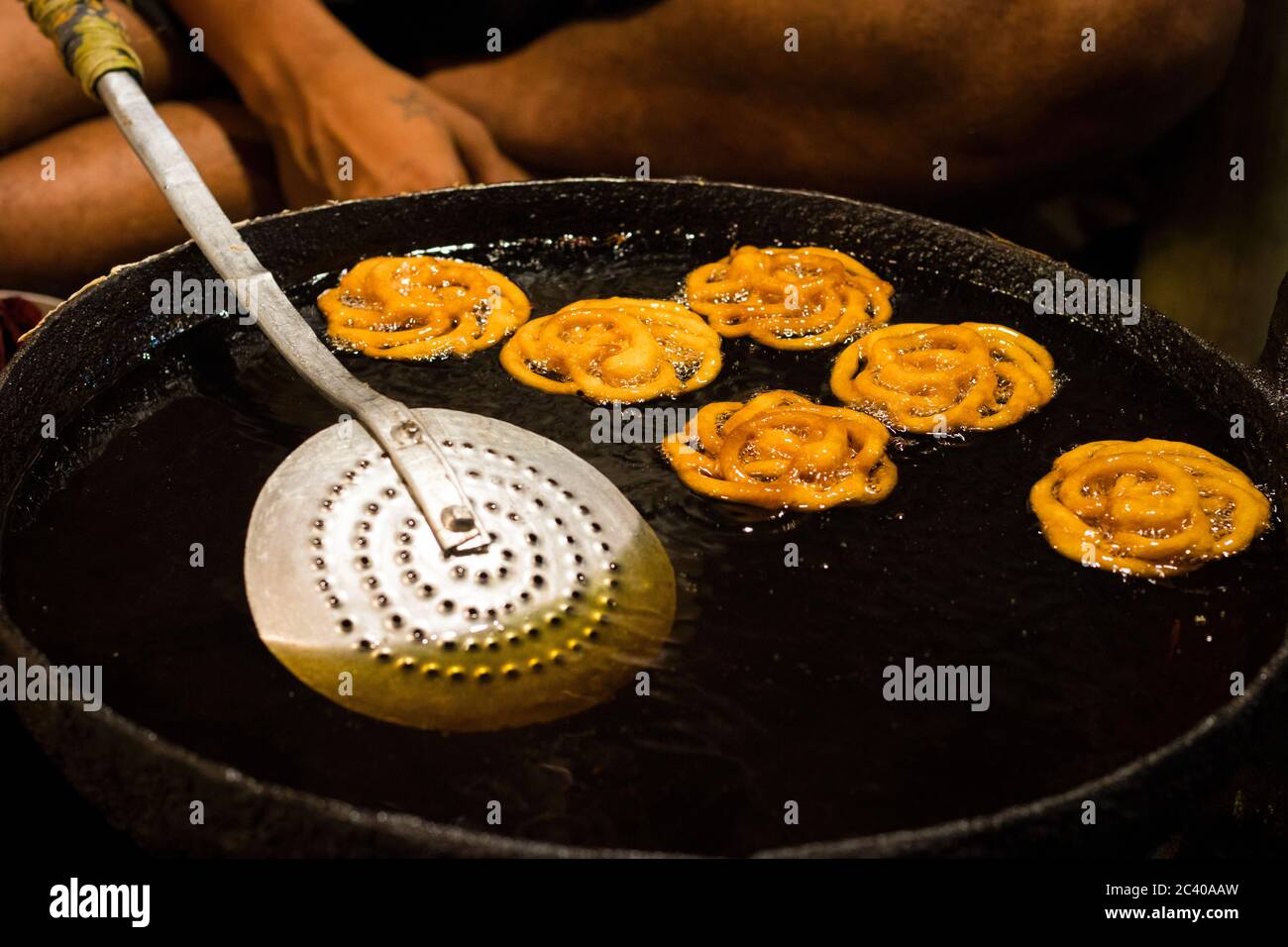 Jalebi is an Indian sweet and delicious food made of Maida flour and sugar syrup Stock Photo