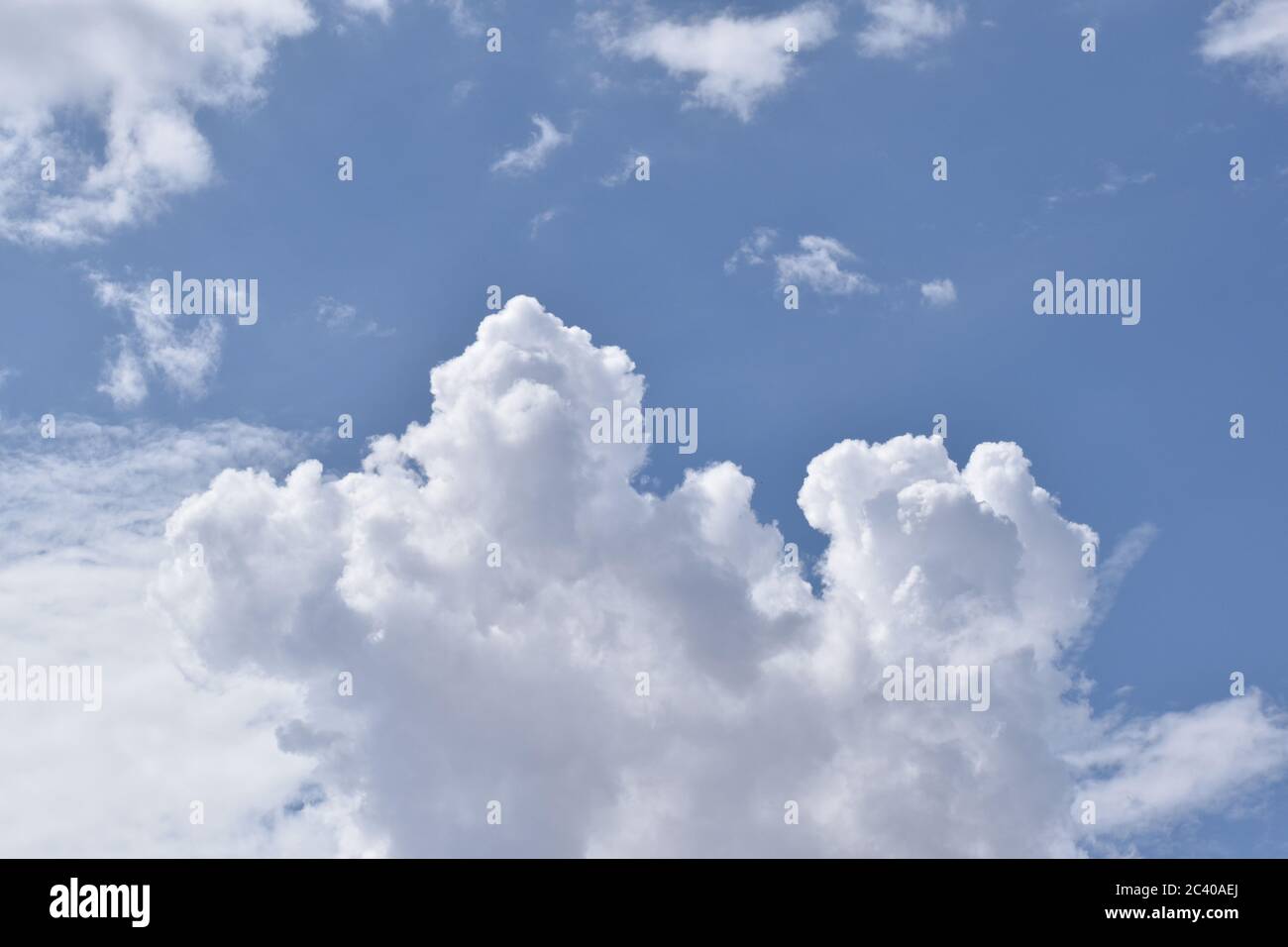 White fluffy soaring clouds hi-res stock photography and images - Alamy