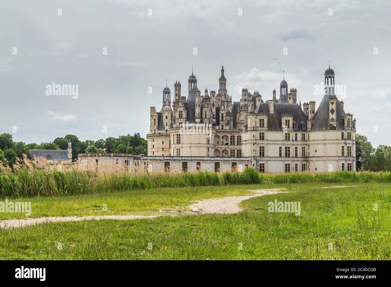 Dark clouds and dramatic scene over Chateau Chambord . Castle with very distinctive French Renaissance architecture Stock Photo