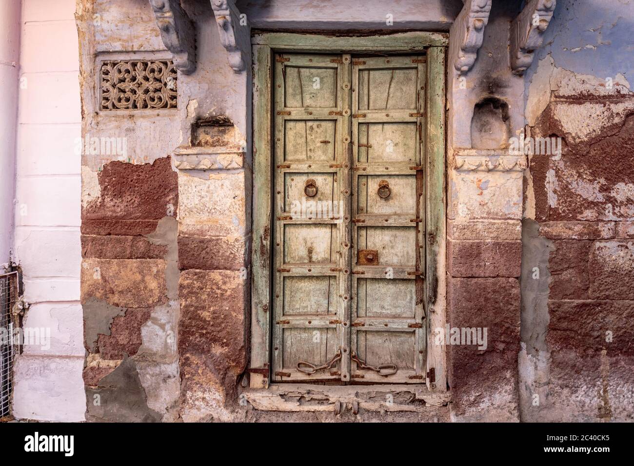 Wood Carved door in the Blue City of Jodhpur, Rajasthan , India. Stock Photo