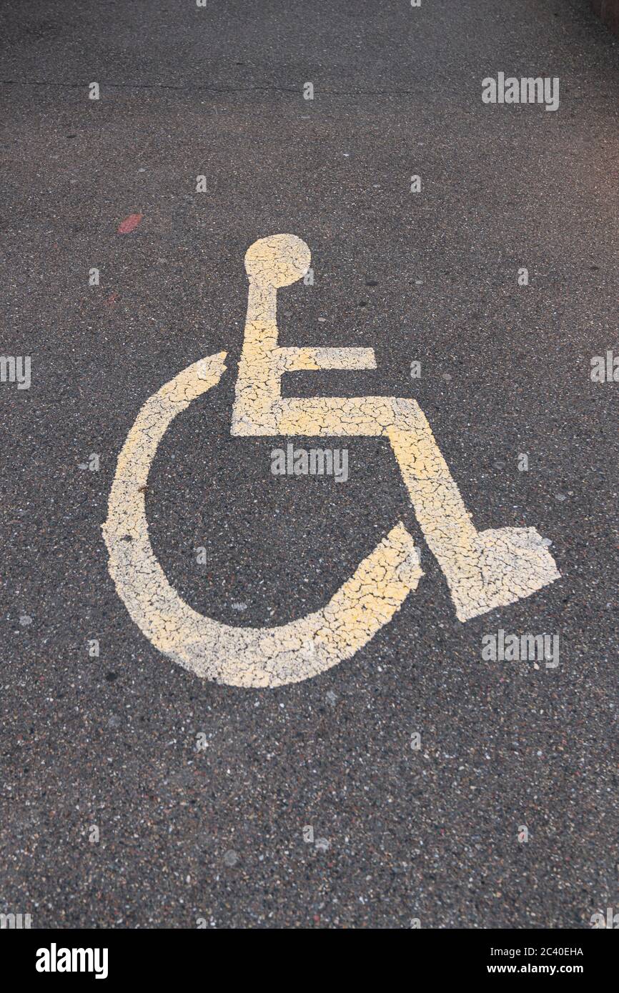 Parking sign for the disabled on the asphalt. vertical photo Stock ...