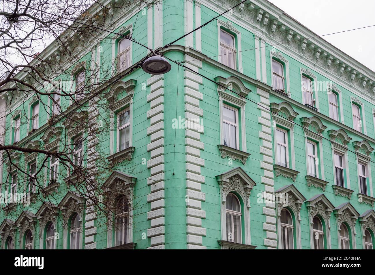 Renovated corner building with facade decoration in Vienna, Austria. A building with Classical Viennese Architecture. Stock Photo