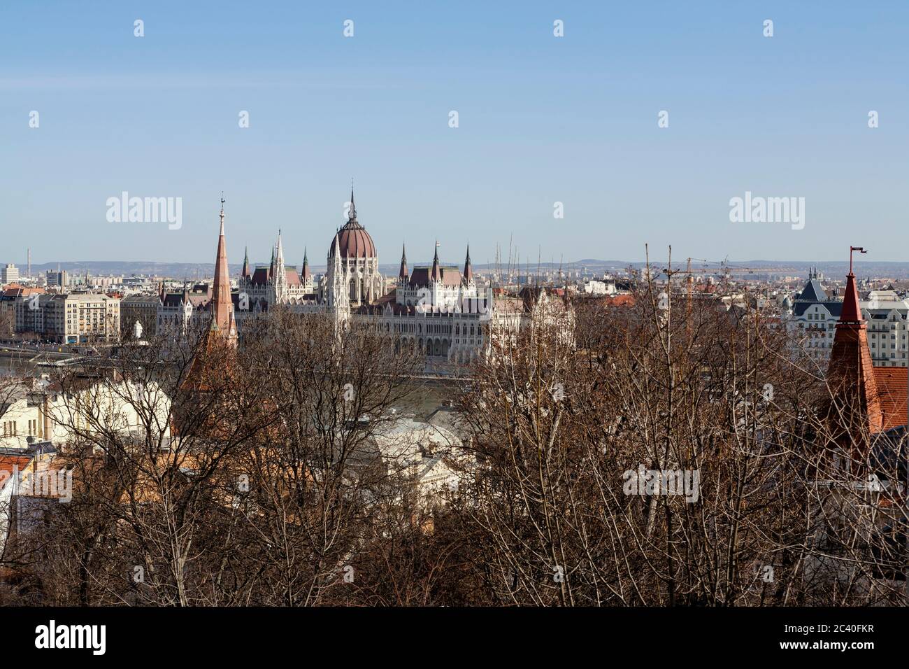 View across the Danube from Víziváros in Buda to Pest on the opposite bank, with the Parliament building prominent: Budapest, Hungary Stock Photo