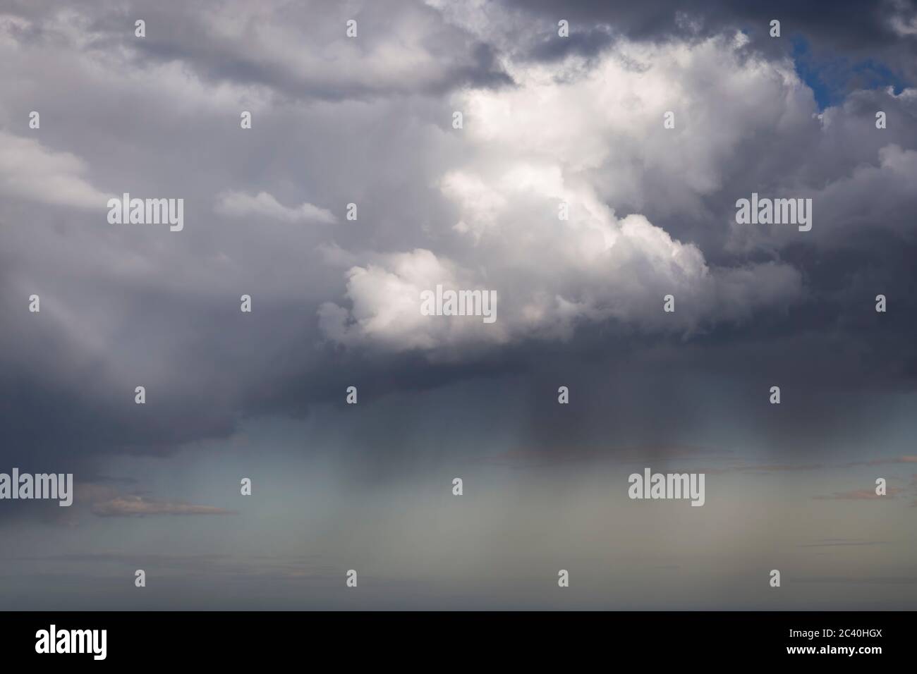 rain clouds hanging over the sea Stock Photo - Alamy