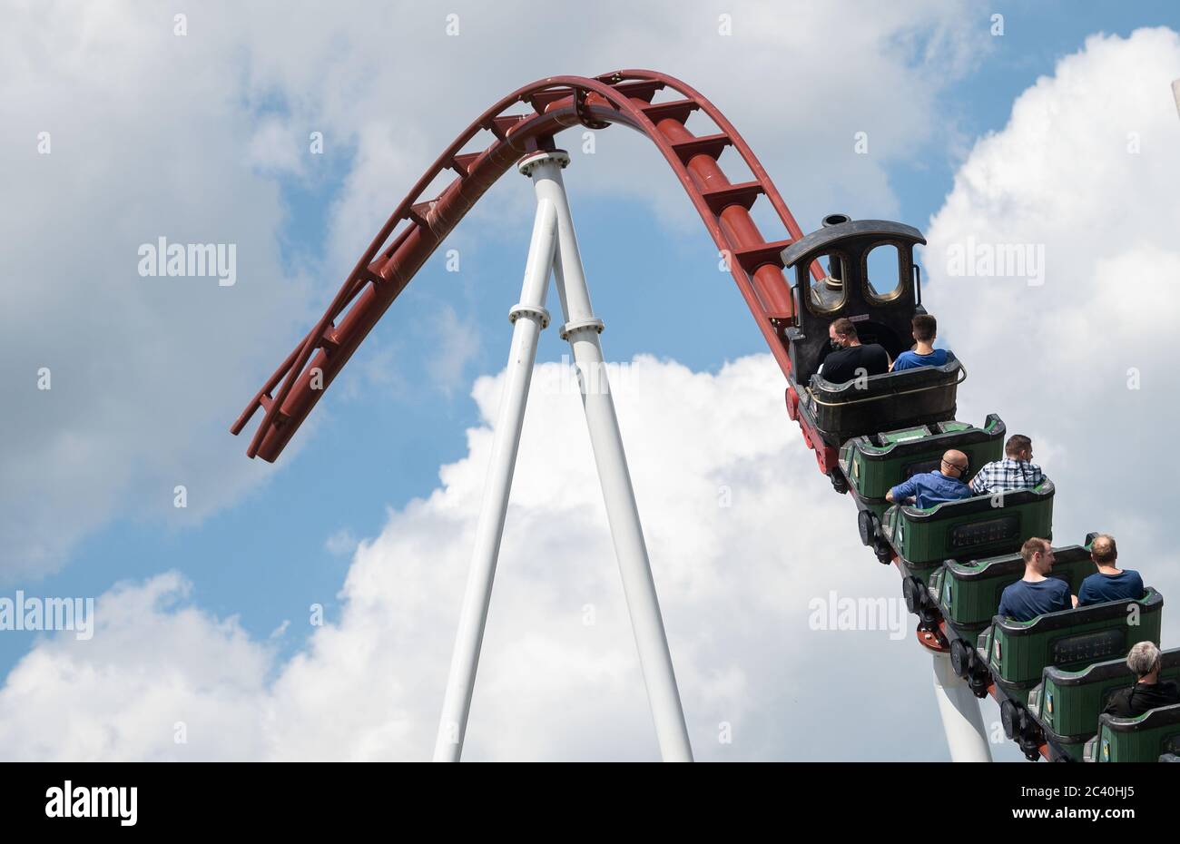 Cleebronn, Germany. 23rd June, 2020. Visitors to the opening event for the  inauguration of two new roller coasters at the Tripsdrill theme park ride  the roller coaster "full steam ahead". For the