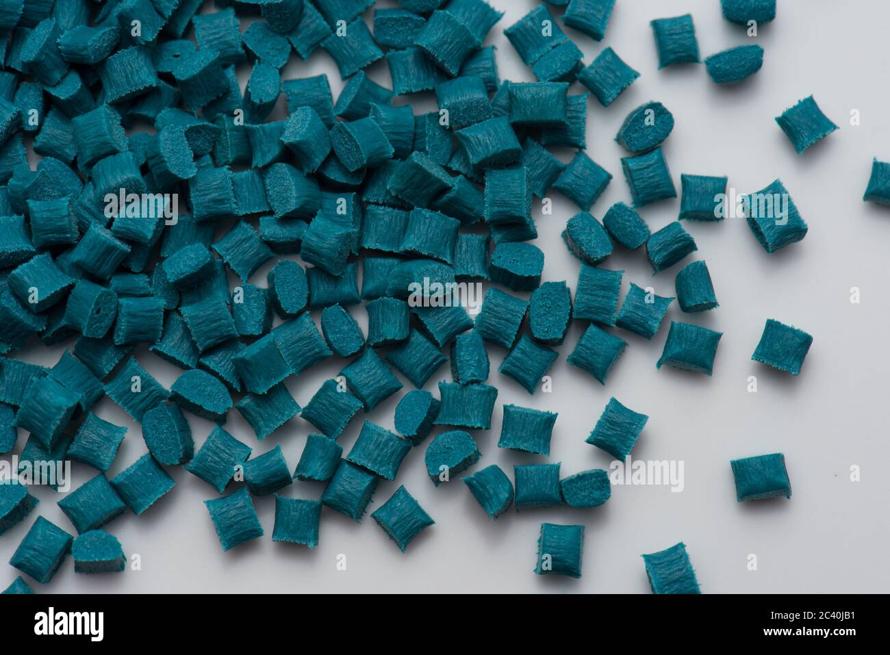 navy blue / turquoise plastic polymer resins with glass-fibre Stock Photo